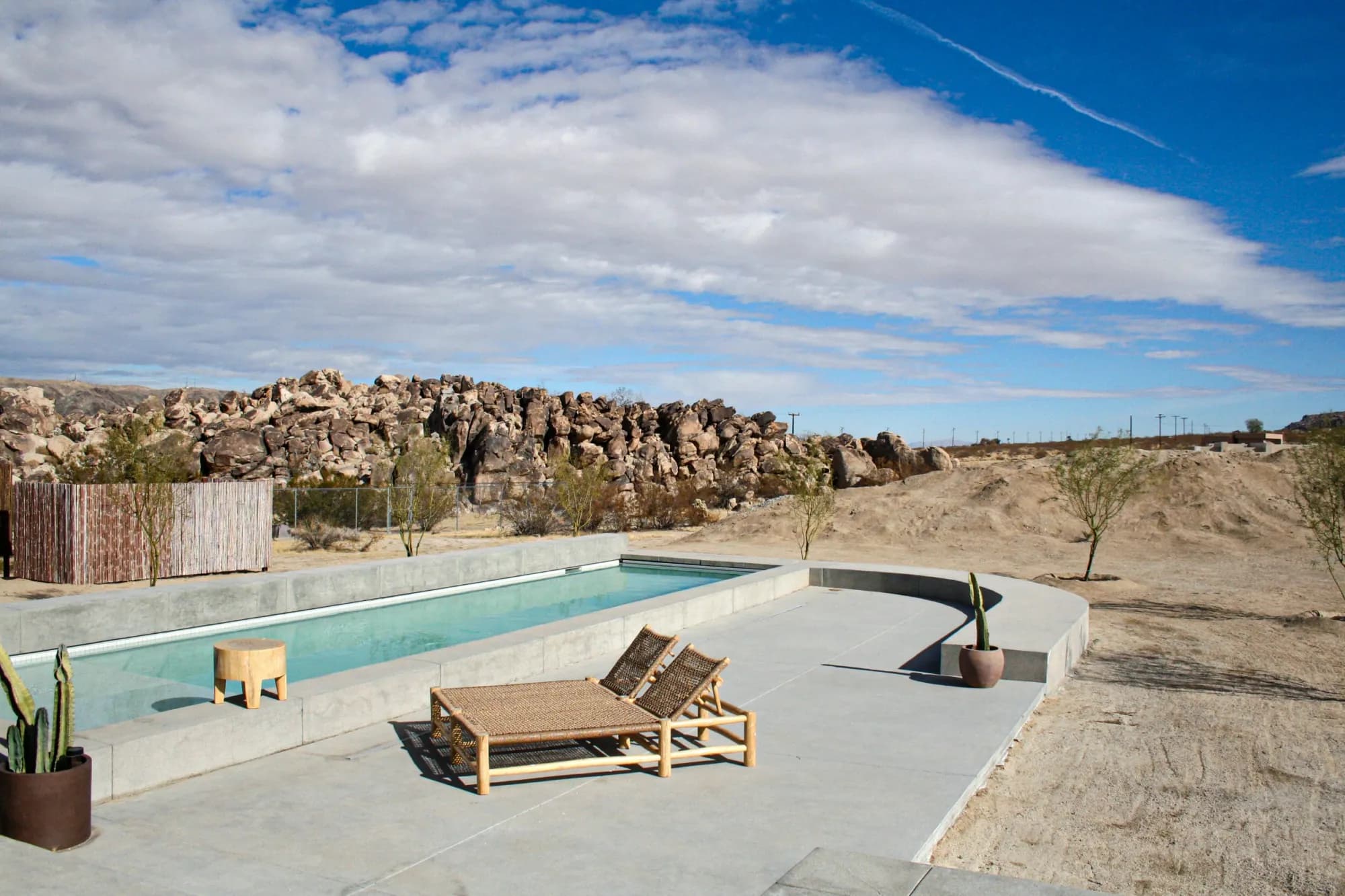 Architectural desert pool with mountain setting by JB Pools