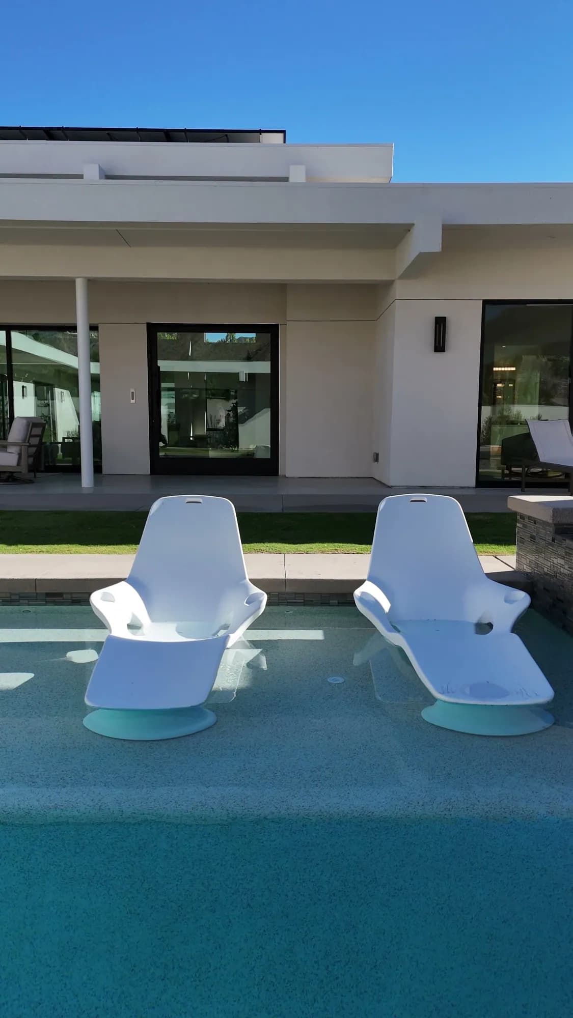 Modern pool remodel with outdoor living