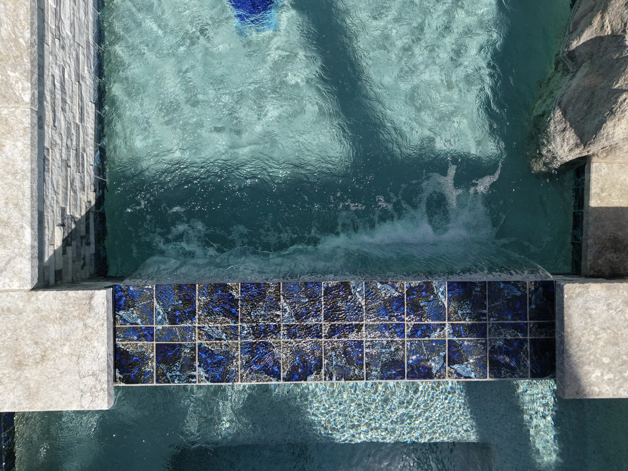 Overhead view of the PWG spa and blue tile spillway